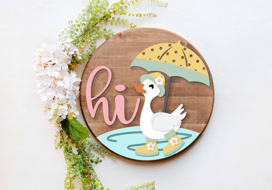 Duck in a puddle with an umbrella DIY sign