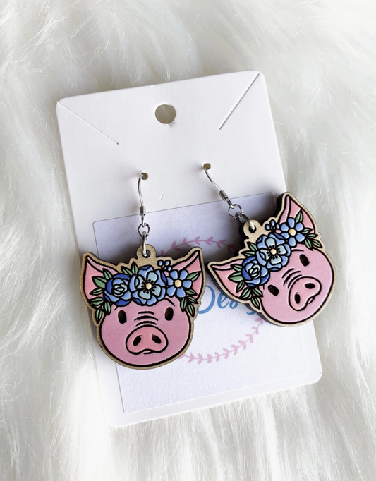 Pig with blue flower crown earrings