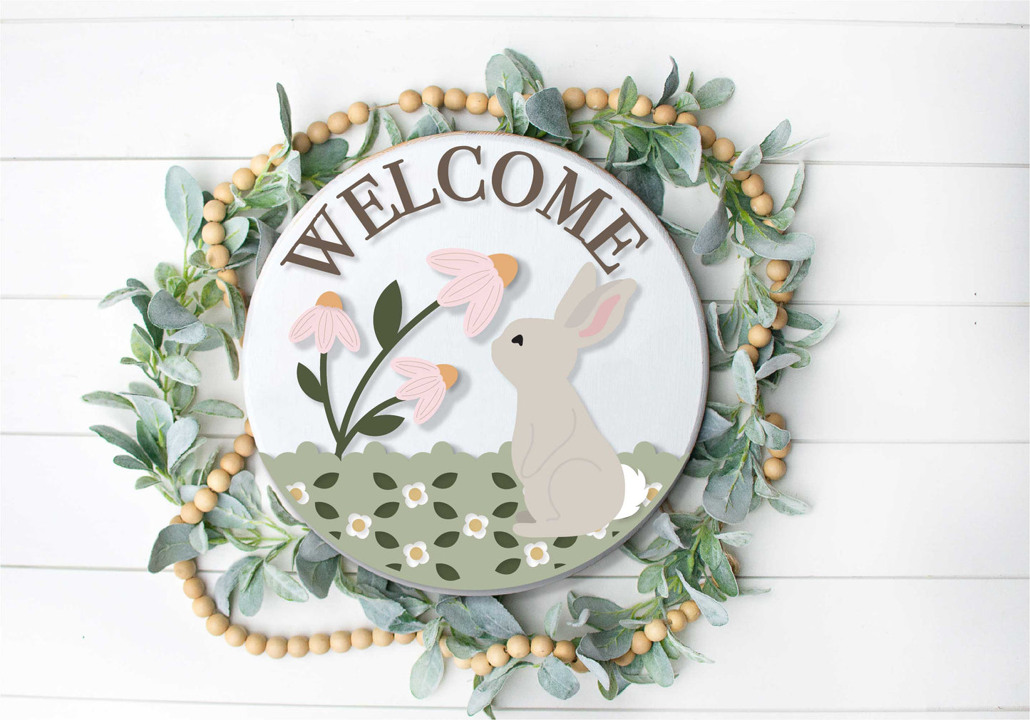 Welcome sign with bunny and flower sign